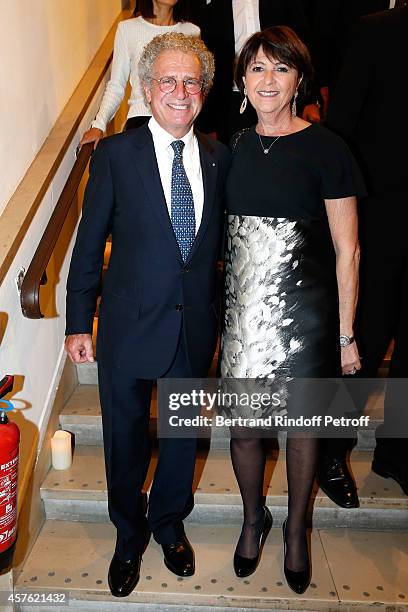 Laurent Dassault and his wife Martine attend the 'Diner des Amis du Musee d'Art Moderne' at Musee d'Art Moderne on October 21, 2014 in Paris, France.