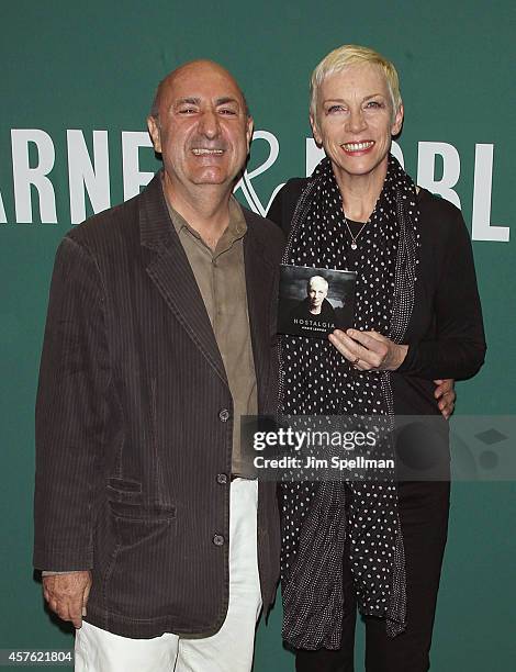 Author/music critic Anthony DeCurtis and singer Annie Lennox sign copies Of "Nostalgia" at Barnes & Noble Union Square on October 21, 2014 in New...
