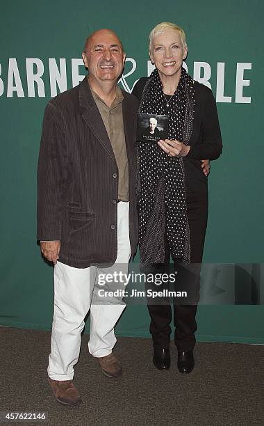 Author/music critic Anthony DeCurtis and singer Annie Lennox sign copies Of "Nostalgia" at Barnes & Noble Union Square on October 21, 2014 in New...