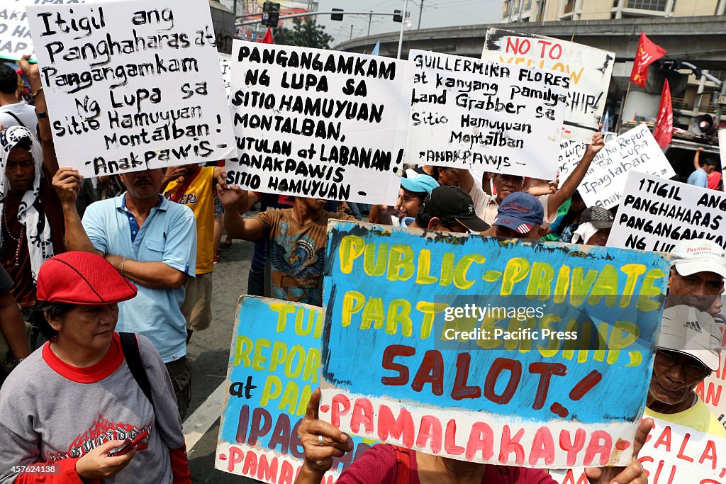 Farmers led by militant peasant group Kilusang Magbubukid ng...