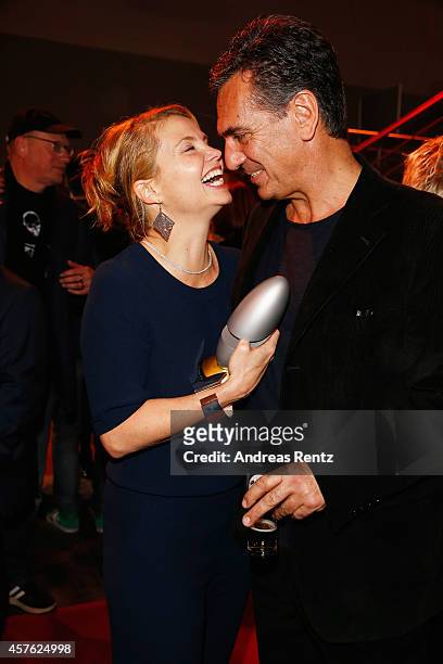 Annette Frier and her partner Johannes Wuensche attend the 18th Annual German Comedy Awards at Coloneum on October 21, 2014 in Cologne, Germany. The...
