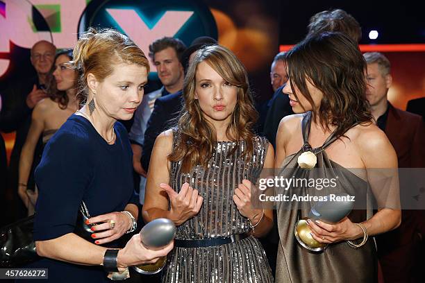 Annette Frier, Carolin Kebekus and Jana Pallaske pose with their awards during the 18th Annual German Comedy Awards at Coloneum on October 21, 2014...