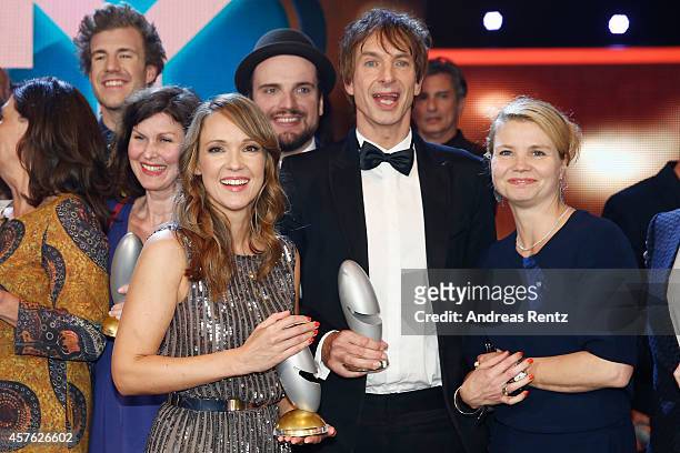 Carolin Kebekus, Ingolf Lueck and Annette Frier pose with their awards during the 18th Annual German Comedy Awards at Coloneum on October 21, 2014 in...