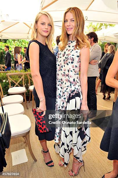 Model Kelly Sawyer and actress Michelle Monaghan attend the 2014 CFDA/Vogue Fashion Fund Event presented by thecorner.com and supported by Aveda,...