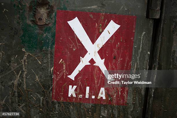 The KIA symbol is painted on an army truck at a training camp in Laiza, Kachin State, Myanmar. The Kachin Independence Army is the military wing of...