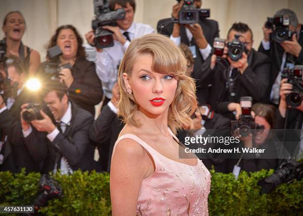 Singer Taylor Swift attends the "Charles James: Beyond Fashion" Costume Institute Gala at the Metropolitan Museum of Art on May 5, 2014 in New York...