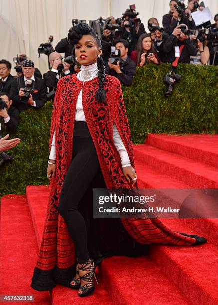 Singer Janelle Monae attends the "Charles James: Beyond Fashion" Costume Institute Gala at the Metropolitan Museum of Art on May 5, 2014 in New York...