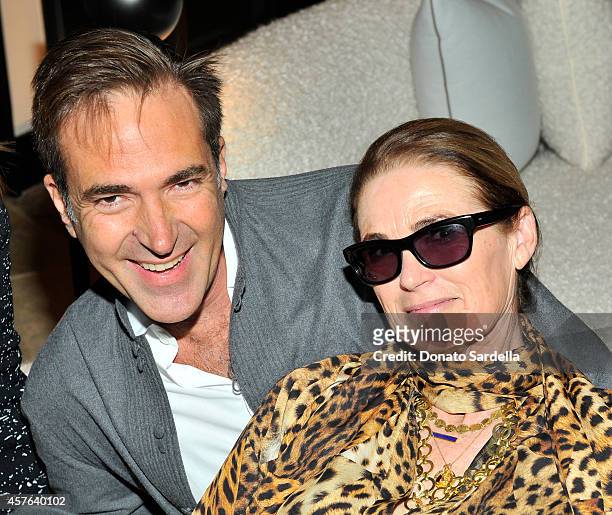 Artist Konstantin Kakanias and West Coast Director of Vogue and Teen Vogue Lisa Love attend the CFDA/Vogue Fashion Fund evening dinner on October 21,...