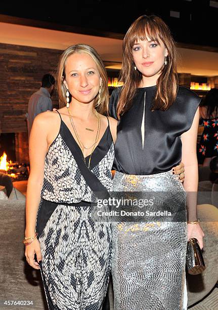 Jewelry designer Jennifer Meyer and actress Dakota Johnson attend the CFDA/Vogue Fashion Fund evening dinner on October 21, 2014 in Los Angeles,...