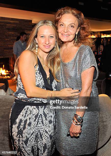 Jewelry designer Jennifer Meyer and fashion designer Diane Von Furstenberg attend the CFDA/Vogue Fashion Fund evening dinner on October 21, 2014 in...