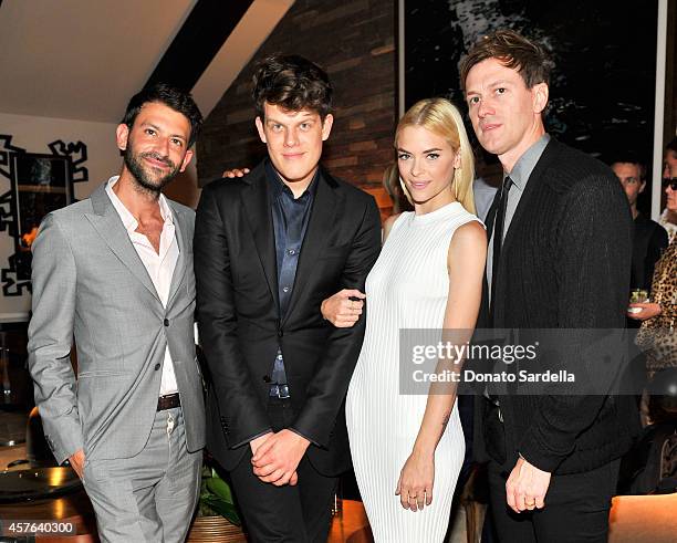 Paul Arnhold, designer Wes Gordon, actress Jaime King and filmmaker Kyle Newman attend the CFDA/Vogue Fashion Fund evening dinner on October 21, 2014...