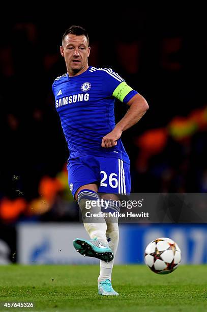 John Terry of Chelsea passes the ball during the UEFA Champions League Group G match between Chelsea FC and NK Maribor at Stamford Bridge on October...