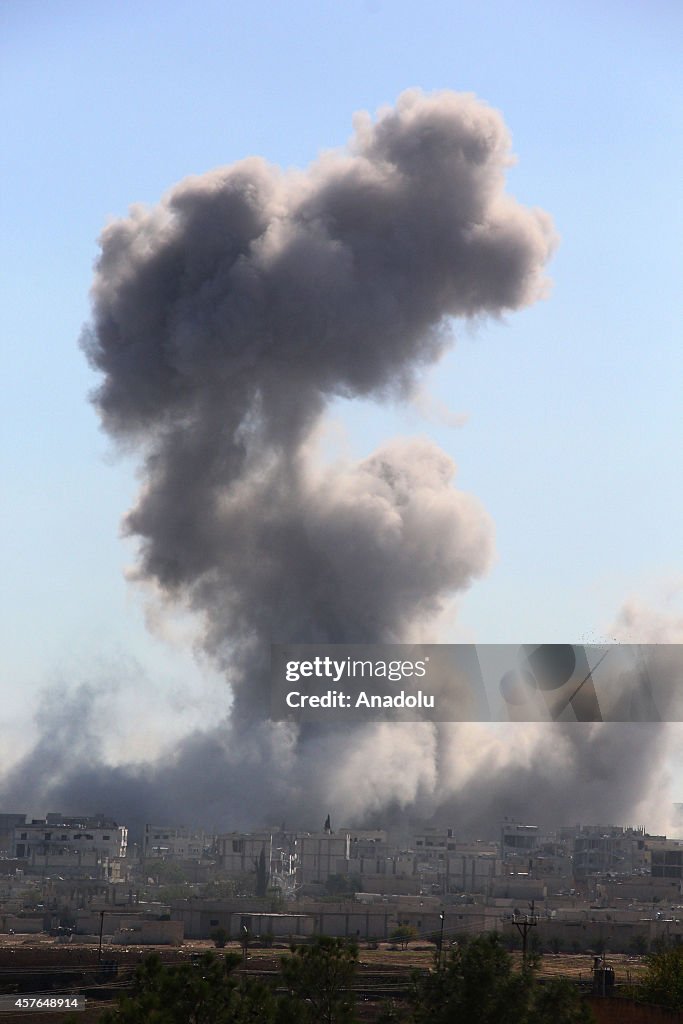 Smoke rising from Kobane is seen from Suruc, Turkey