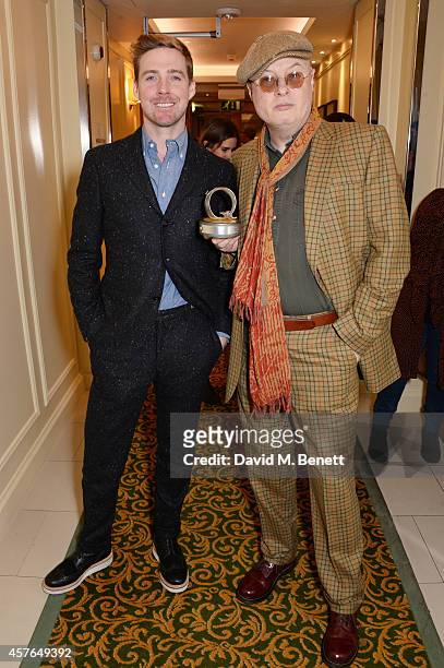 Ricky Wilson and Andy Partridge, winner of the Q Songwriter award, pose in the press room at the Xperia Access Q Awards at The Grosvenor House Hotel...