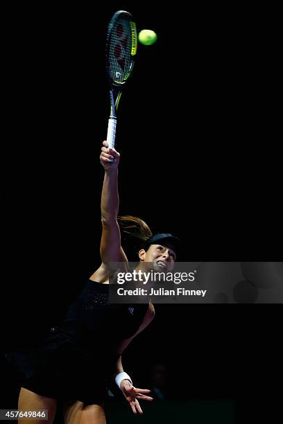 Ana Ivanovic of Serbia in action against Eugenie Bouchard of Canada during day three of the BNP Paribas WTA Finals tennis at the Singapore Sports Hub...