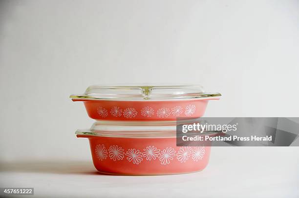 Pyrex Pink Daisy casserole dishes were first released in 1956. Monday, October 6, 2014.