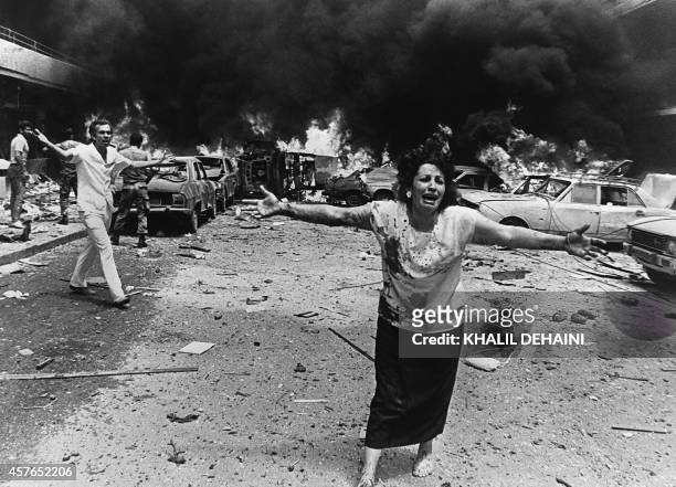 Woman cries in shock, minutes after a car bomb exploded in a crowded neighborhood of mainly-Moslem West Beirut 08 August 1986, killing 13 people,...
