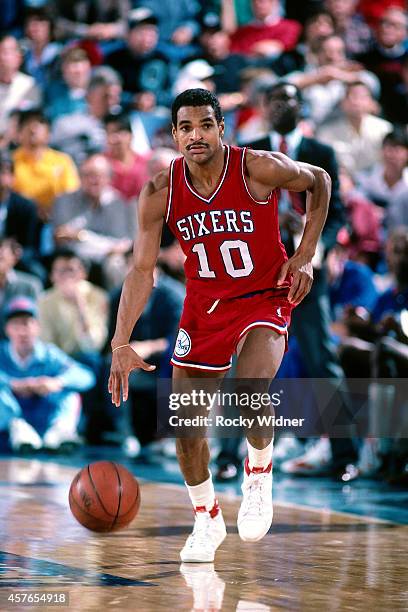 Maurice Cheeks of the Philadelphia 76ers dribbles against the Sacramento Kings on November 12, 1987 at Arco Arena in Sacramento, California. NOTE TO...