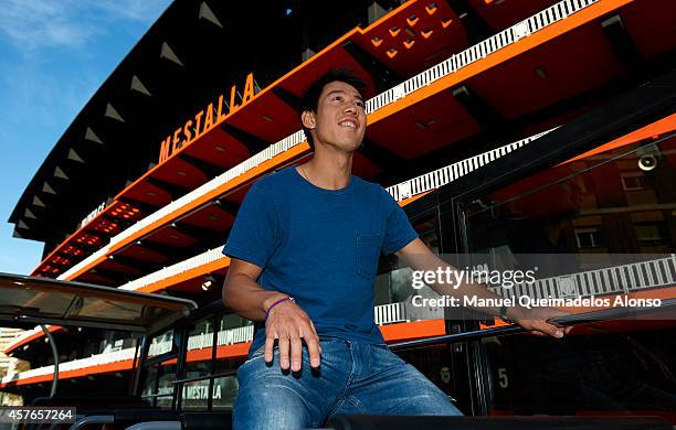 Kei Nishikori of Japan visits Mestalla Stadium during day three of the ATP 500 World Tour Valencia Open tennis tournament at the Ciudad de las Artes...