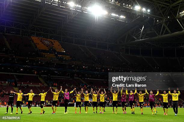 The Dortmund players celebrate their 4-0 victory during UEFA Champions League Group D match between Galatasaray and Borussia Dortmund at Turk Telekom...