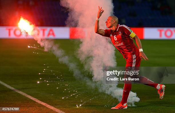 Wael Gomaa of Al Ahly throws a flare away during the FIFA Club World Cup 5th place match between Al Ahly SC and CF Monterrey at Marrakech Stadium on...