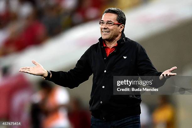 Head coach Vanderlei Luxemburgo of Flamengo gestures during a match between Flamengo and Internacional as part of Brasileirao Series A 2014 at...