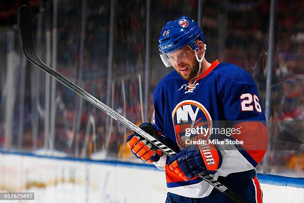 Thomas Vanek of the New York Islanders skates against the Montreal Canadiens at Nassau Veterans Memorial Coliseum on December 14, 2013 in Uniondale,...