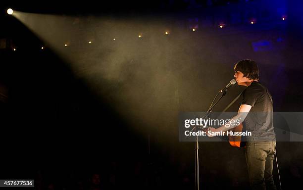 Jake Bugg performs on stage for Mencap's Little Noise Sessions at the Union Chapel on October 22, 2014 in London, United Kingdom.