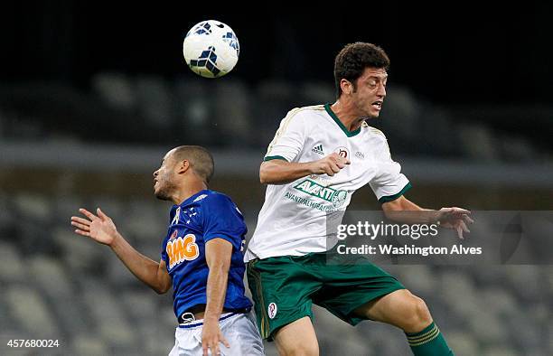 Mayke of Cruzeiro struggles for the ball with Felipe Menezes of Palmeiras during a match between Cruzeiro and Palmeiras as part of Brasileirao Series...