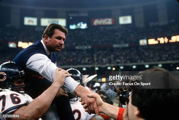 Head Coach Mike Ditka of the Chicago Bears gets carried off the field after they defeated the New England Patriots in Super Bowl XX January 26, 1986...