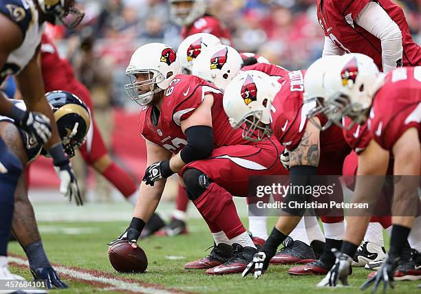 Center Lyle Sendlein of the Arizona Cardinals prepares to snap the football during the NFL game against the St. Louis Rams at the University of...