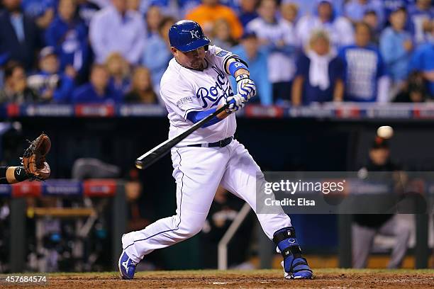 Billy Butler of the Kansas City Royals hits an RBI single in the sixth inning against the San Francisco Giants during Game Two of the 2014 World...