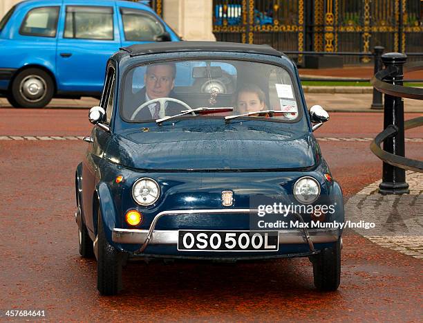 Viscount David Linley and his daughter Margarita Armstrong-Jones arrive at Buckingham Palace to attend a Christmas Lunch hosted by Queen Elizabeth II...