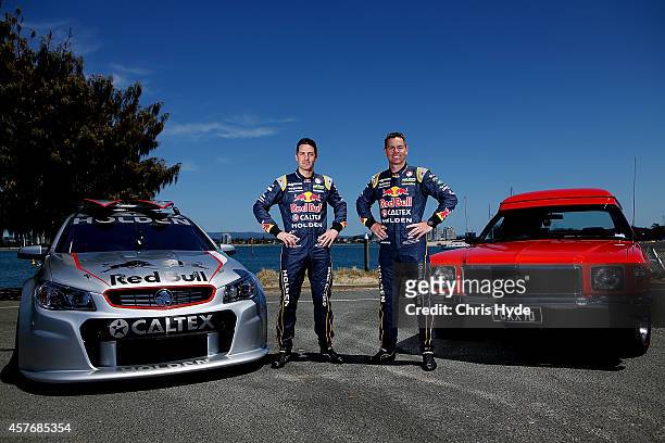 Drivers Jamie Whincup and Craig Lowndes of Red Bull Racing Australia launch the Tribute edition sandman at Main Beach on October 23, 2014 in Gold...