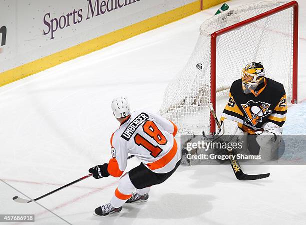 Umberger of the Philadelphia Flyers scores past Marc-Andre Fleury of the Pittsburgh Penguins during the third period at Consol Energy Center on...