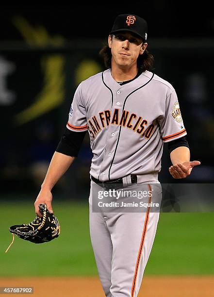 Tim Lincecum of the San Francisco Giants reacts against the Kansas City Royals during Game Two of the 2014 World Series at Kauffman Stadium on...