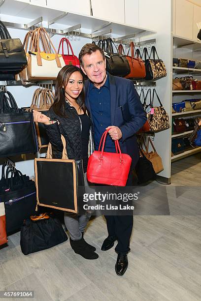 Fox 29 News anchors Alex Holley and Mike Jerrick attend the Century 21 Department Store Grand Opening Party in Philadelphia on October 22, 2014 in...