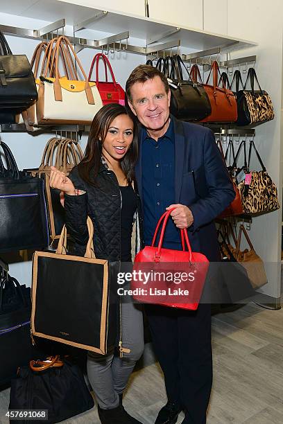 Fox 29 News anchors Alex Holley and Mike Jerrick attend the Century 21 Department Store Grand Opening Party in Philadelphia on October 22, 2014 in...