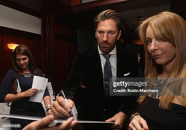 Dawn DuBois and Henrik Lundqvist attend Gotham Magazine Celebrates Cover Star Henrik Lundqvist At Wolfgang's Steakhouse on October 22, 2014 in New...