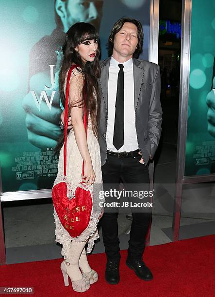 Ciscandra Nostalghia and Tyler Bates attend Summit Entertainment's premiere of 'John Wick' at the ArcLight Theater on October 22, 2014 in Hollywood,...