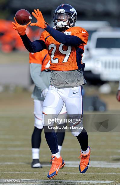 Denver Broncos Michael Huff catches a pass during practice December 18, 2013 at Dove Valley