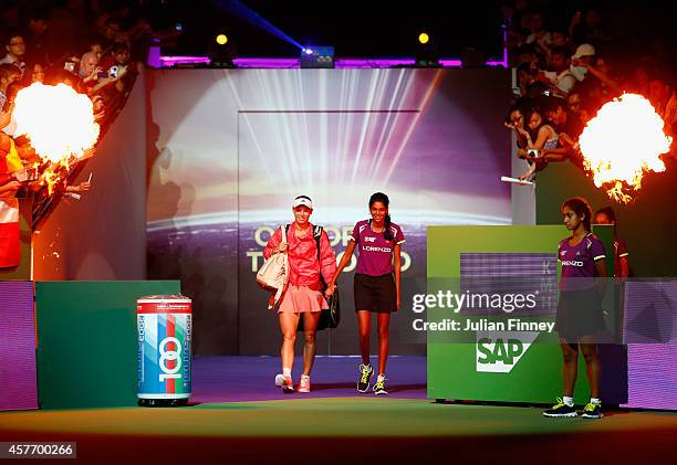 Caroline Wozniacki of Denmark walks out before her match against Agnieszka Radwanska of Poland during day four of the BNP Paribas WTA Finals tennis...