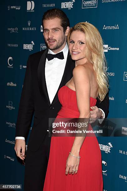 Tomaso Trussardi and Michelle Hunziker attend 'Un'Altra Storia' Charity Event Benefiting Doppia Difesa Arrivals during the 9th Rome Film Festival at...