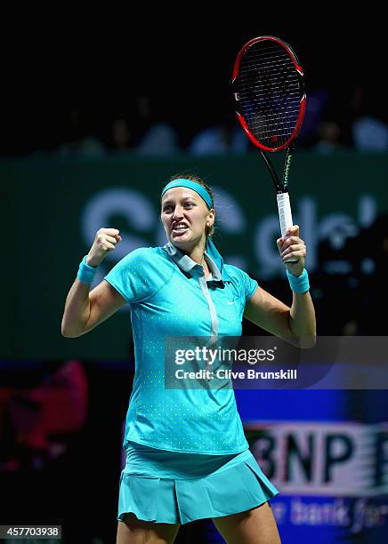 Petra Kvitova of the Czech Republic celebrates match point against Maria Sharapova of Russia in their round robin match during the BNP Paribas WTA...