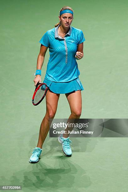 Petra Kvitova of Czech Republic celebrates winning a game against Maria Sharapova of Russia during day four of the BNP Paribas WTA Finals tennis at...