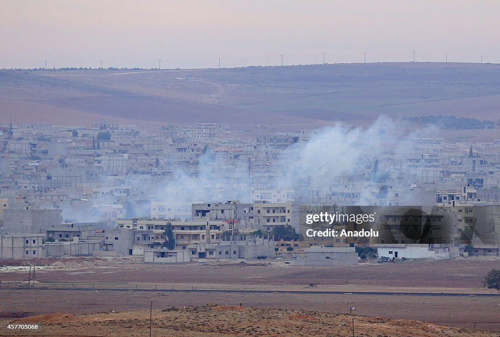 Smoke rising from Kobani seen from Turkey's Suruc