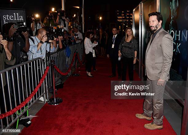 Actor Keanu Reeves arrives at a screening of Lionsgate Films' "John Wick" at the Arclight Theatre on October 22, 2014 in Los Angeles, California.