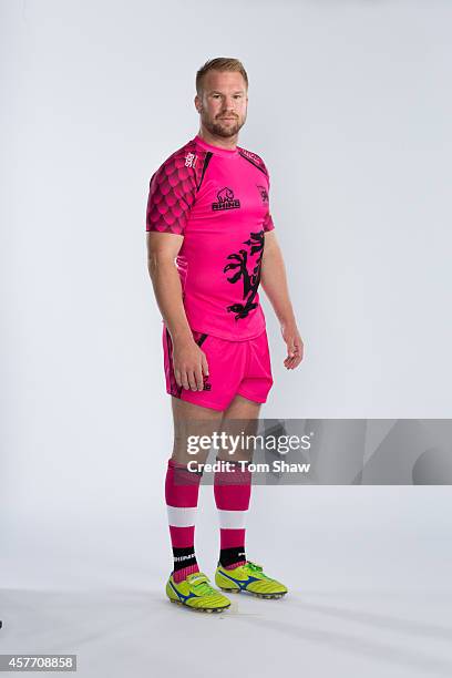 Cameron Goodhue of London Welsh poses for a picture during the London Welsh Photocall at Old Deer Park on August 29, 2014 in Richmond Upon Thames,...