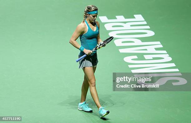 Eugenie Bouchard of Canada shows her dejection against Serena Williams of the United States in their round robin match during the BNP Paribas WTA...