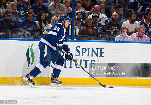 Matt Carle of the Tampa Bay Lightning skates against the Florida Panthers at the Amalie Arena on October 9, 2014 in Tampa, Florida.